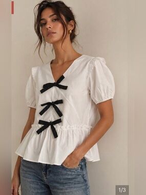 JODIFL White Peplum Blouse with Black Bow Details Size Large BNWT